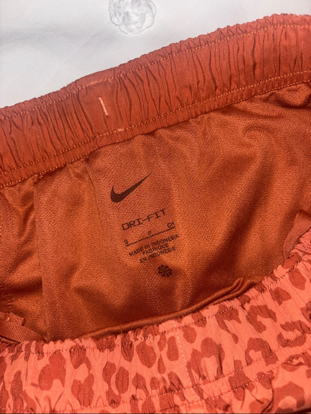 Nike Women’s Orange Leopard Print Running Shorts - Picture 2 of 3